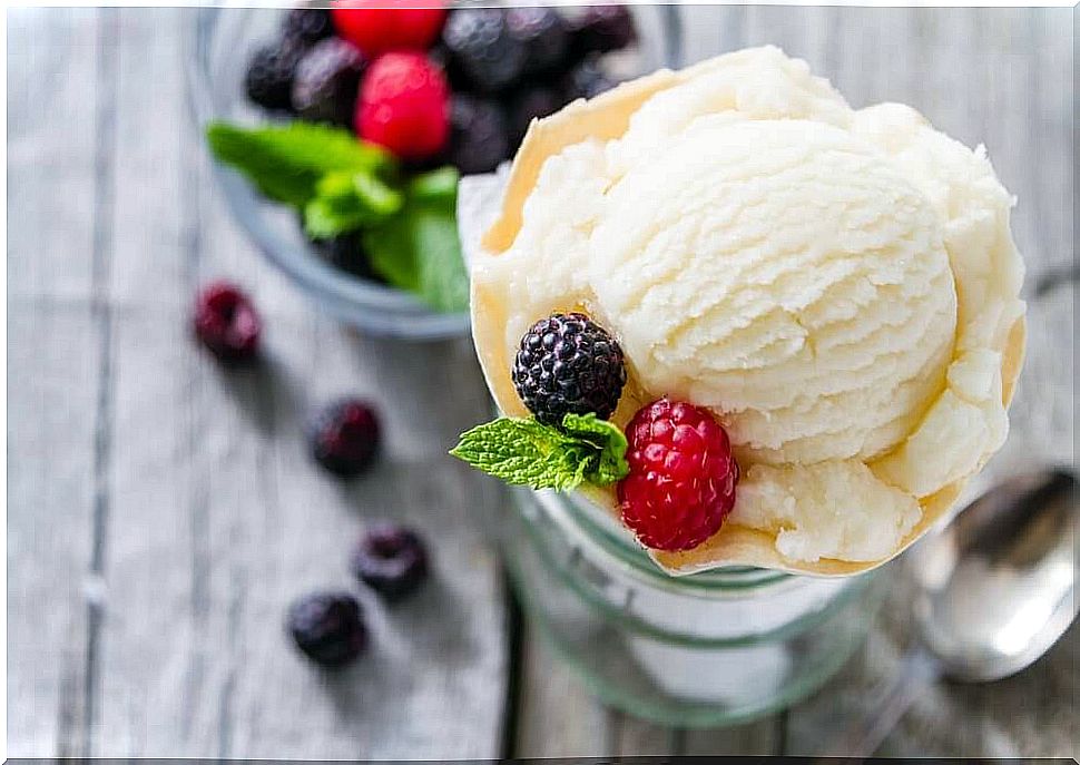 Vanilla ice cream with red berries.
