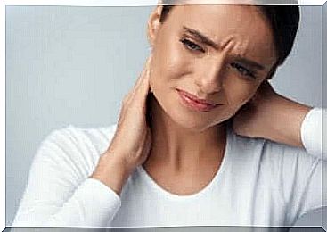 A woman with a sore neck. 